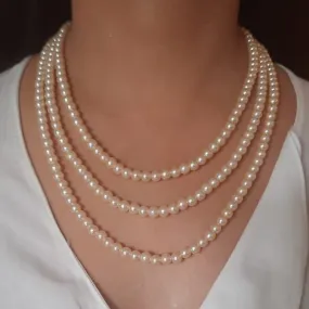 Estele Gold Plated Creamy pearl three layered necklace for women